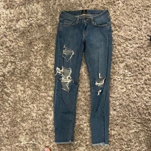 Light wash ripped skinny jeans